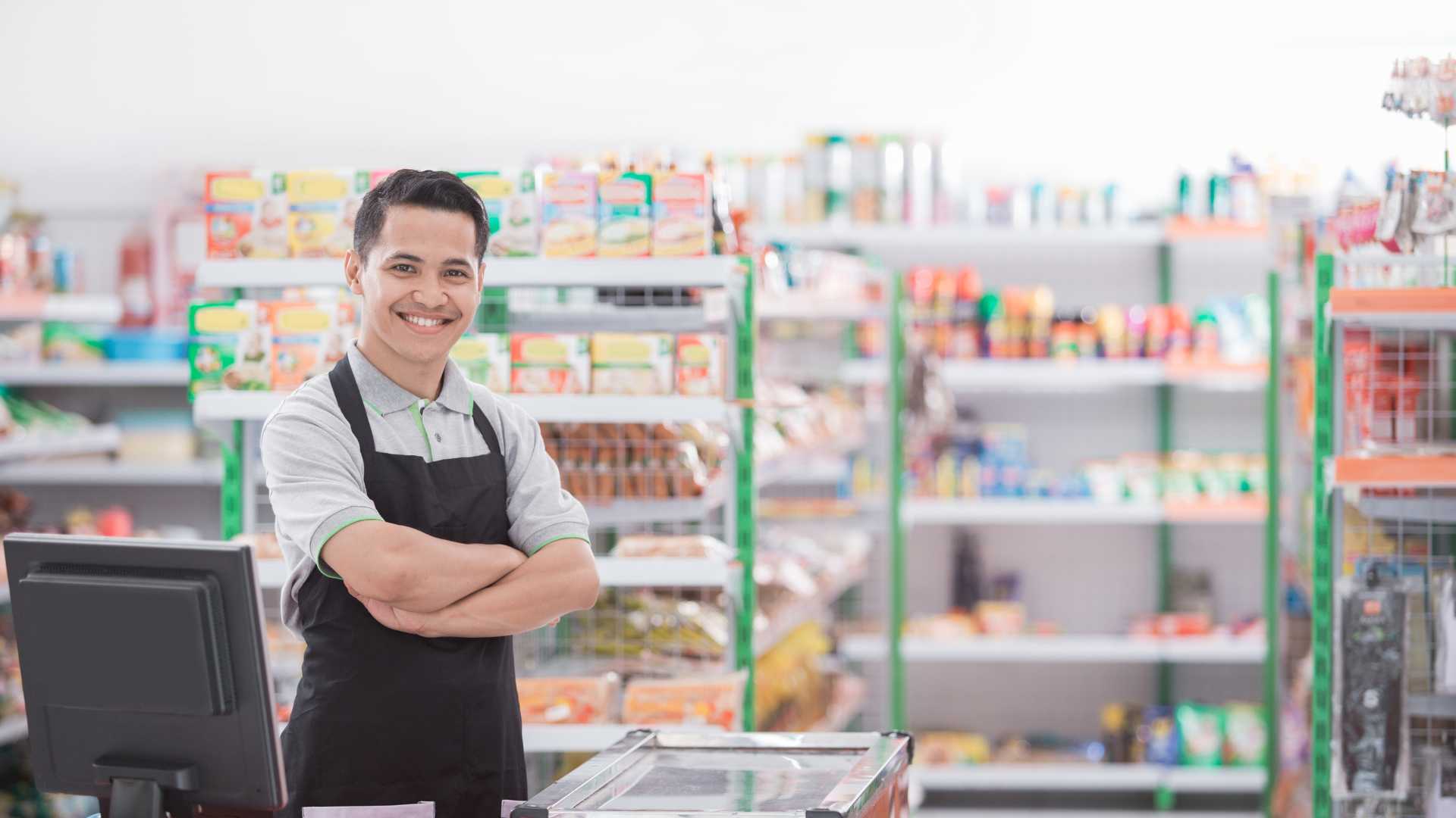 Confident Cashier after receiving Retail Training block 9 vancouver